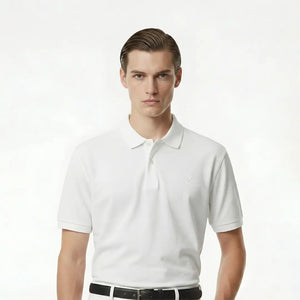 Man wearing a white polo shirt on a white background