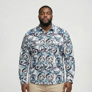 Man wearing a patterned shirt against a plain background