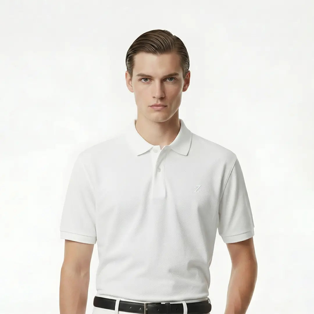 Man wearing a white polo shirt on a white background